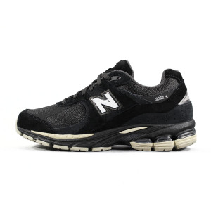 NEW BALANCE U2002RL...